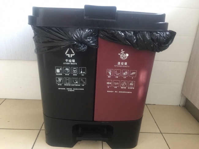 Kitchen waste segregation bins installed on every floor on Tongji University dormitories